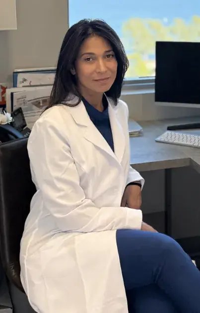 A clinician at the consultation desk in the Organic Well office, Coconut Grove, Miami