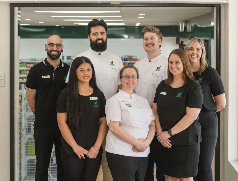 Lismore Pharmacy team group photo inside the pharmacy