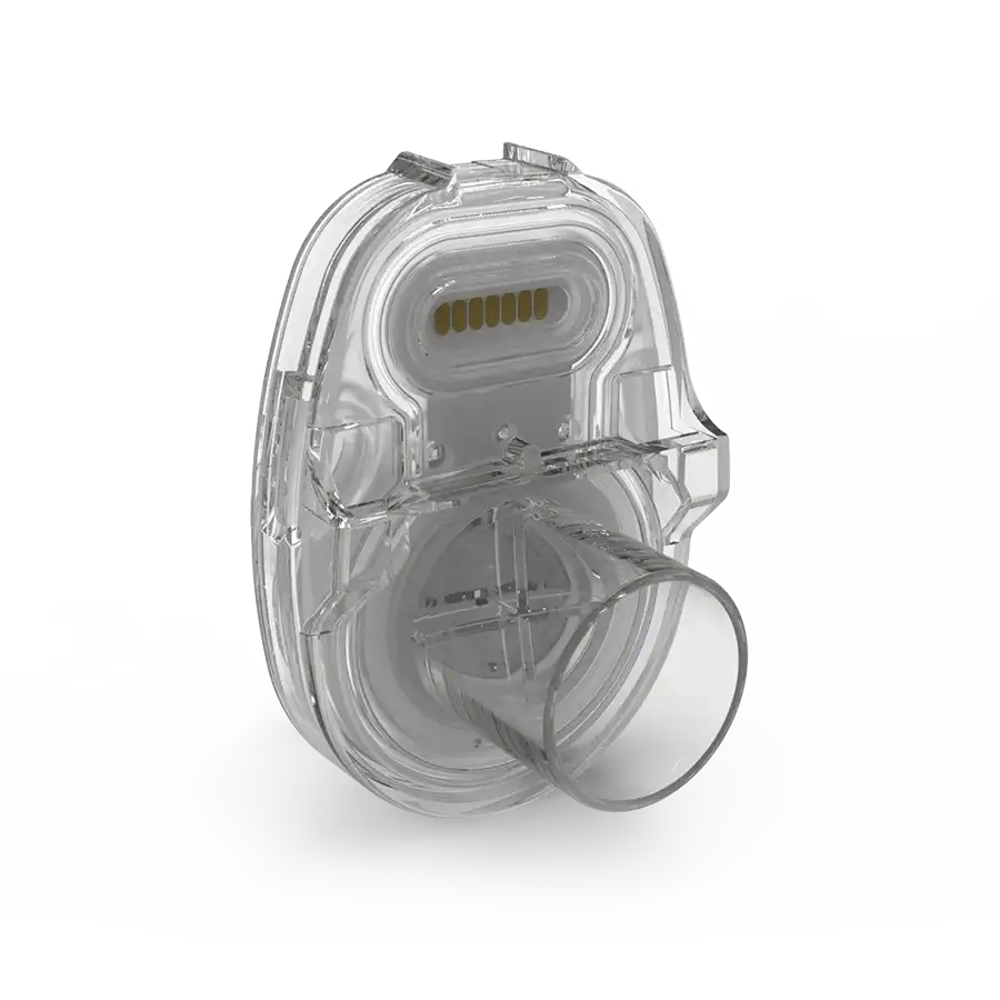 Transparent plastic cartridge with a round nozzle and electrical contacts at the back.