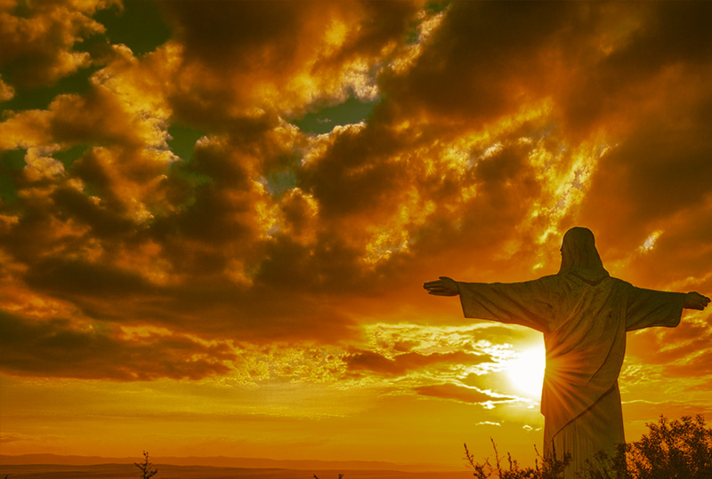 Jesus Christ's tomb that her crawled of of with a cross at the opening of the cave