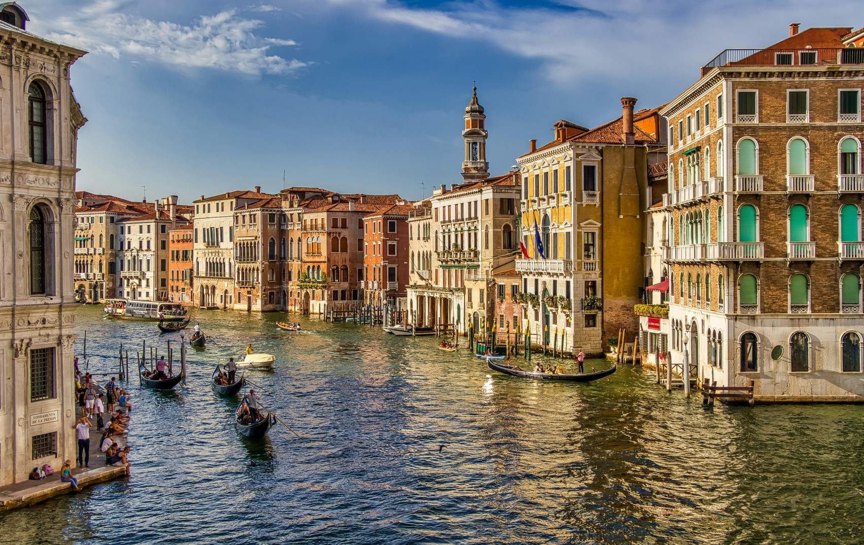 Venice Grand Canal with gondolas and historic waterfront buildings, Italy