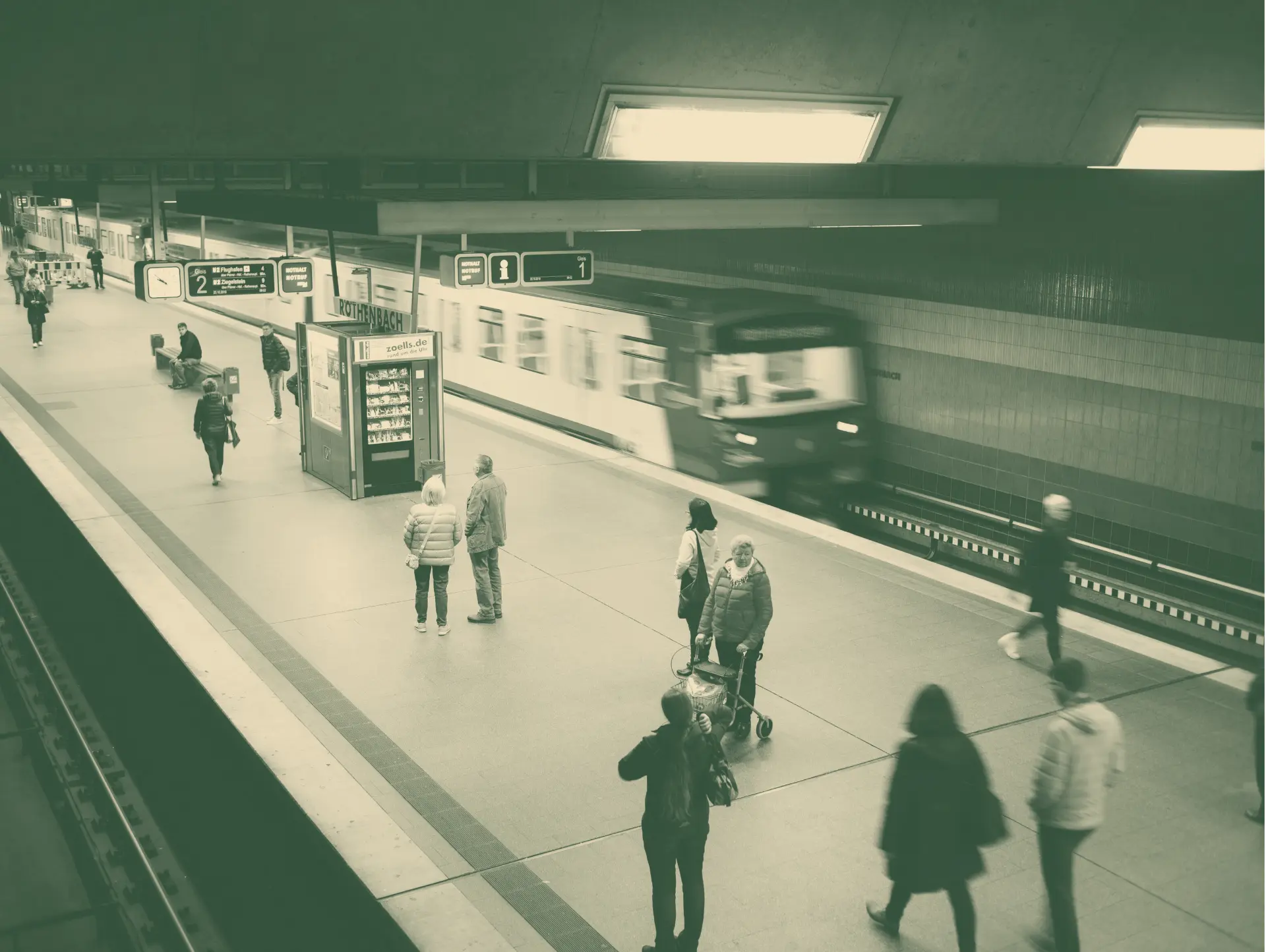 people passing by moving train