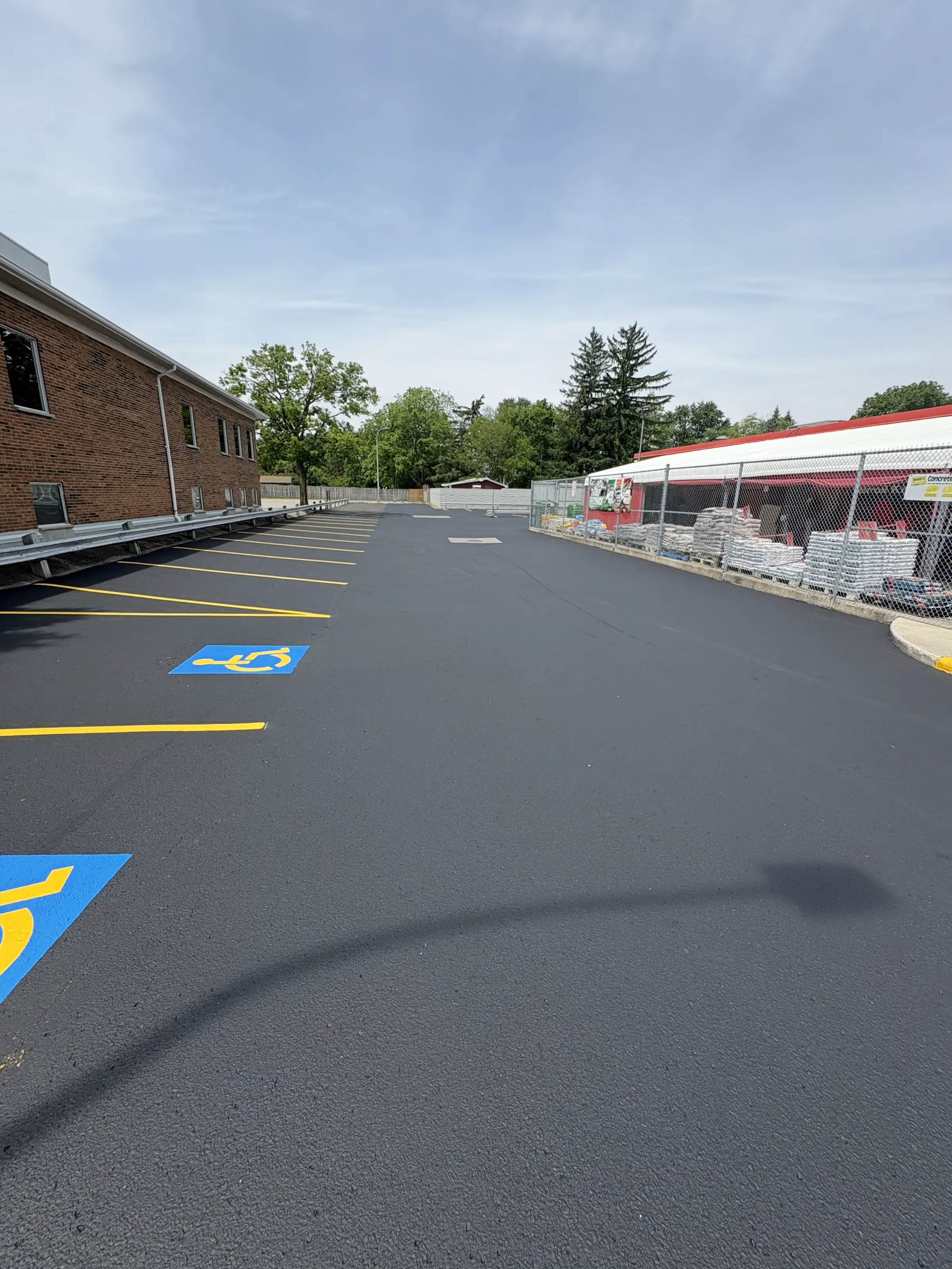 Why Asphalt Emulsion Sealcoating Offers Longer-Term Performance
