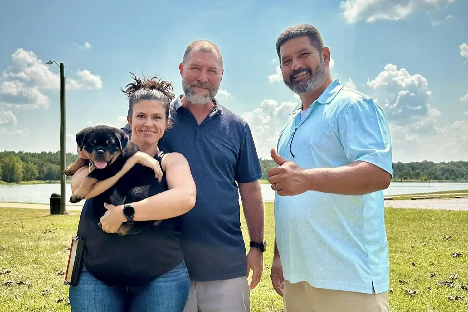 DKV Rottweilers families with their German Rottweiler puppies at pickup day, showcasing happy owners, strong bloodlines, early development, and premium Rottweiler puppies for sale from a trusted breeder in the USA