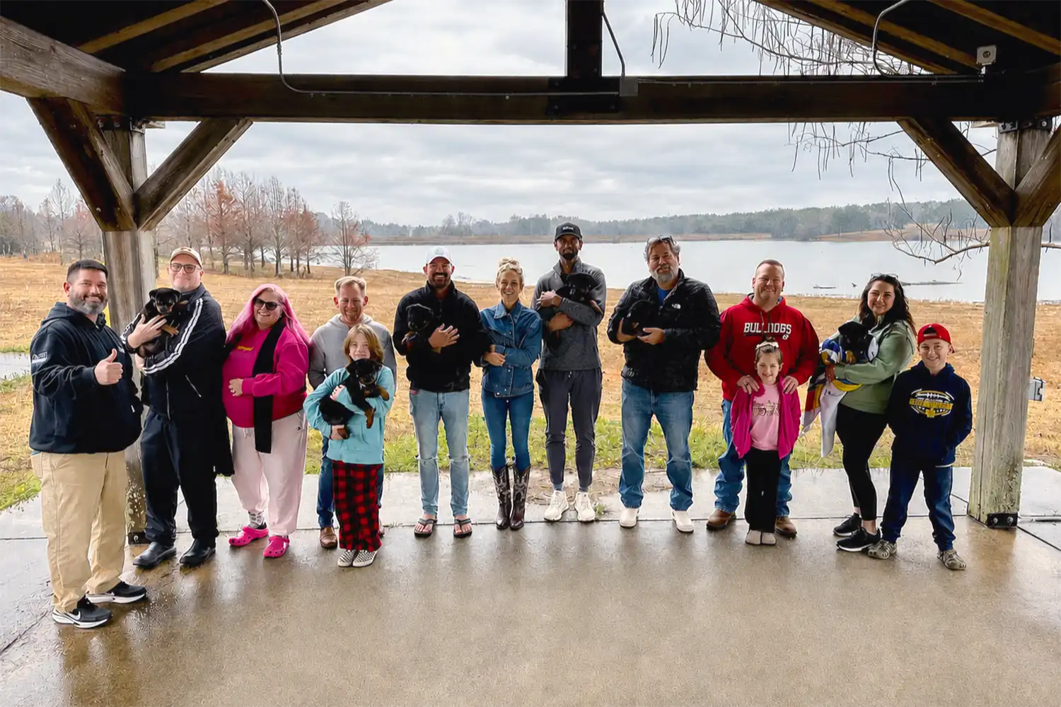 DKV Rottweilers families with their German Rottweiler puppies at pickup day, showcasing happy owners, strong bloodlines, early development, and premium Rottweiler puppies for sale from a trusted breeder in the USA