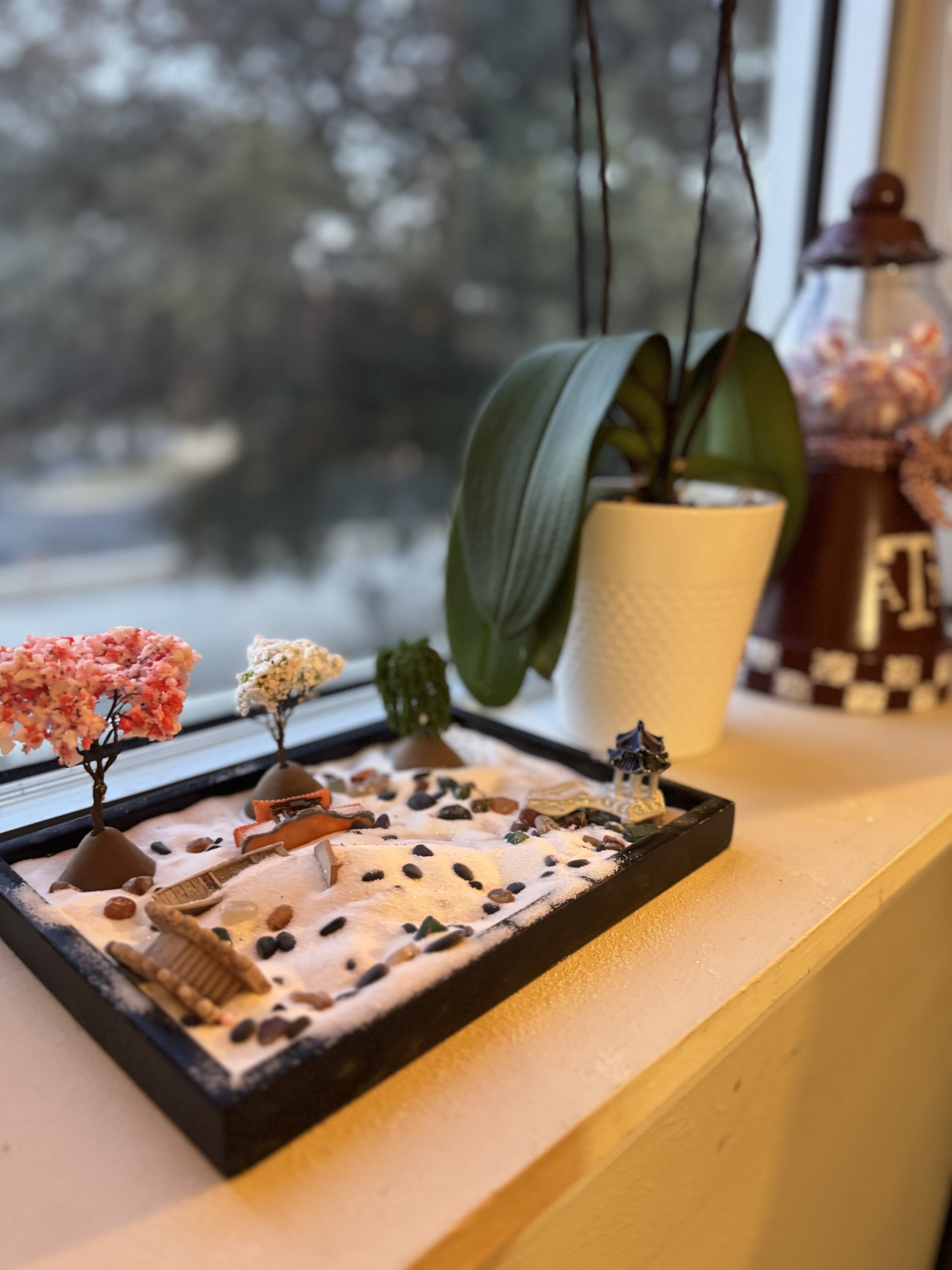 Sand tray by the window in Chelsea's Fort Worth therapy office