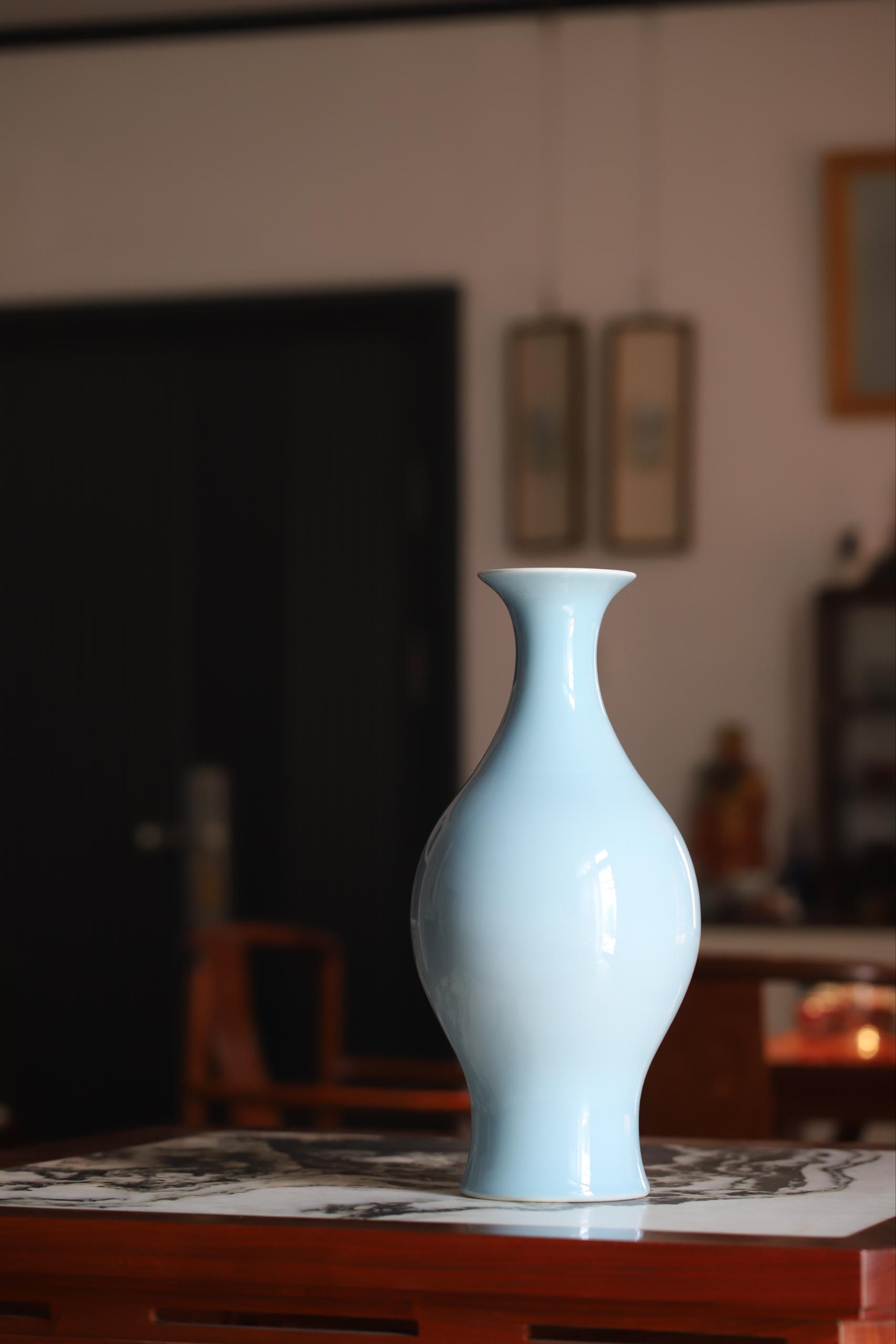 Olive-shaped vase with sky-blue glaze