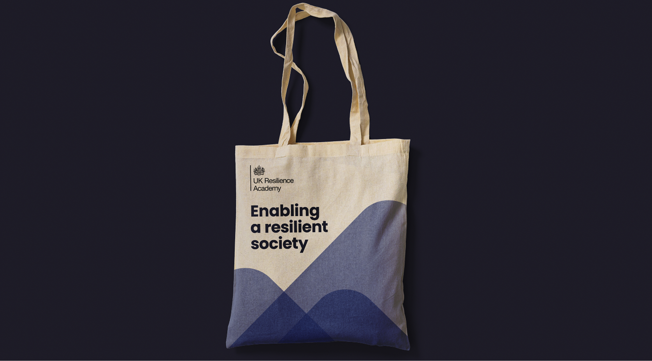 A tote bag featuring the new SERCO brand