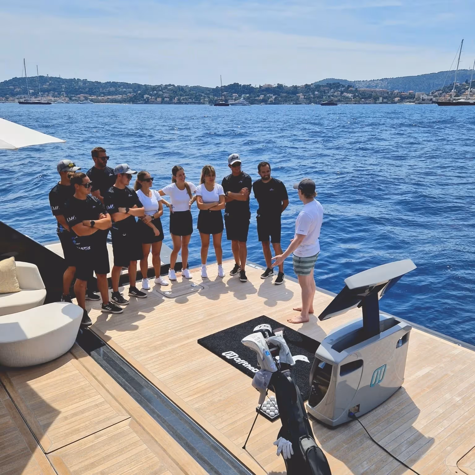 Alex, CEO of Off the Deck , introducing the SeaDriveCX to the crew of Loon .