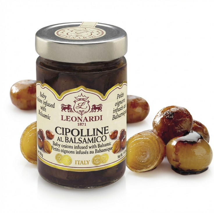 Jar of Leonardi Baby Onion Infused with Aged Balsamic with a few single onions on white counter