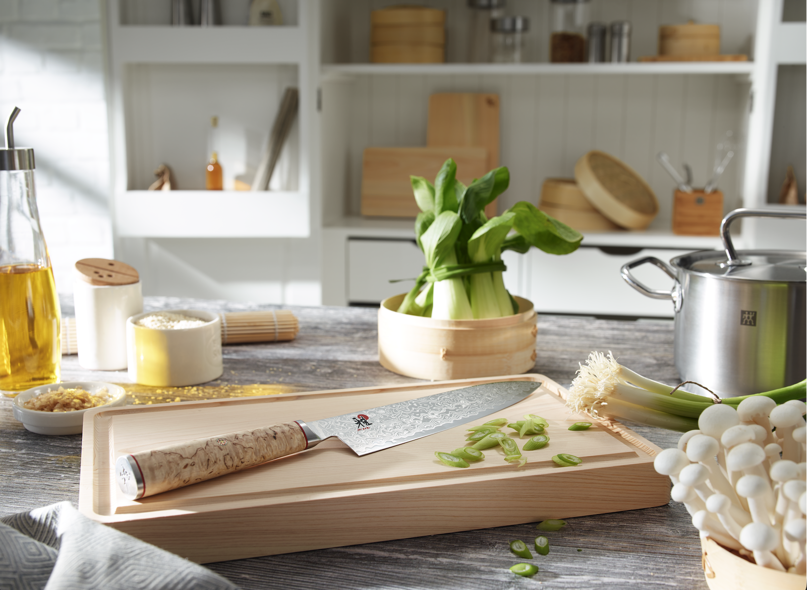 Miyabi Santoku Knife on Kitchen Bench with vegetables