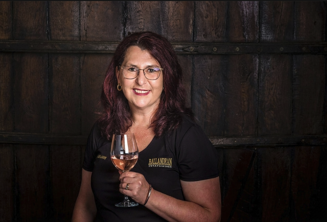 Leeanne Puglisi Gamgemi ith a glass of 2026 Rose