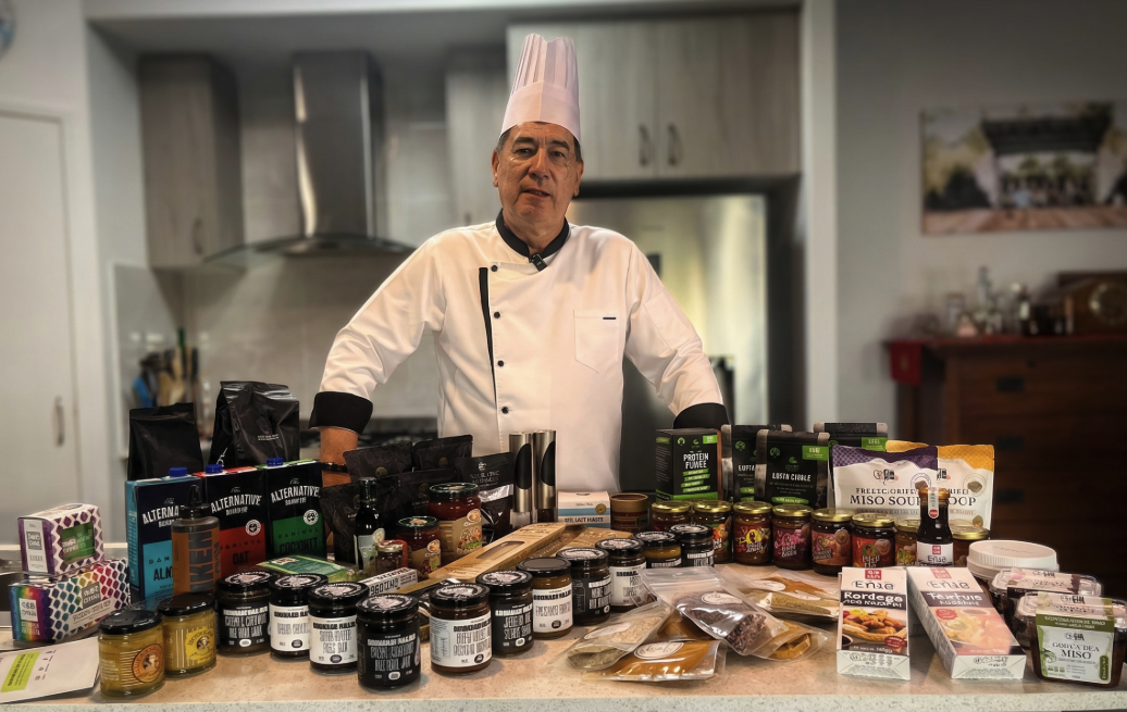 Chef Ian with an example of Pantry ingredinets spread on his kitchen bench