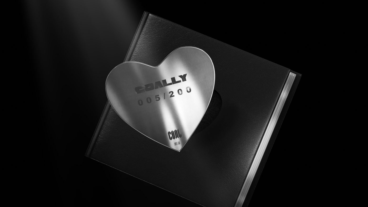 The numbered steel heart medallion on the front cover of the lore book.