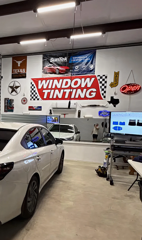 Interior of Texas Window Tinting garage.