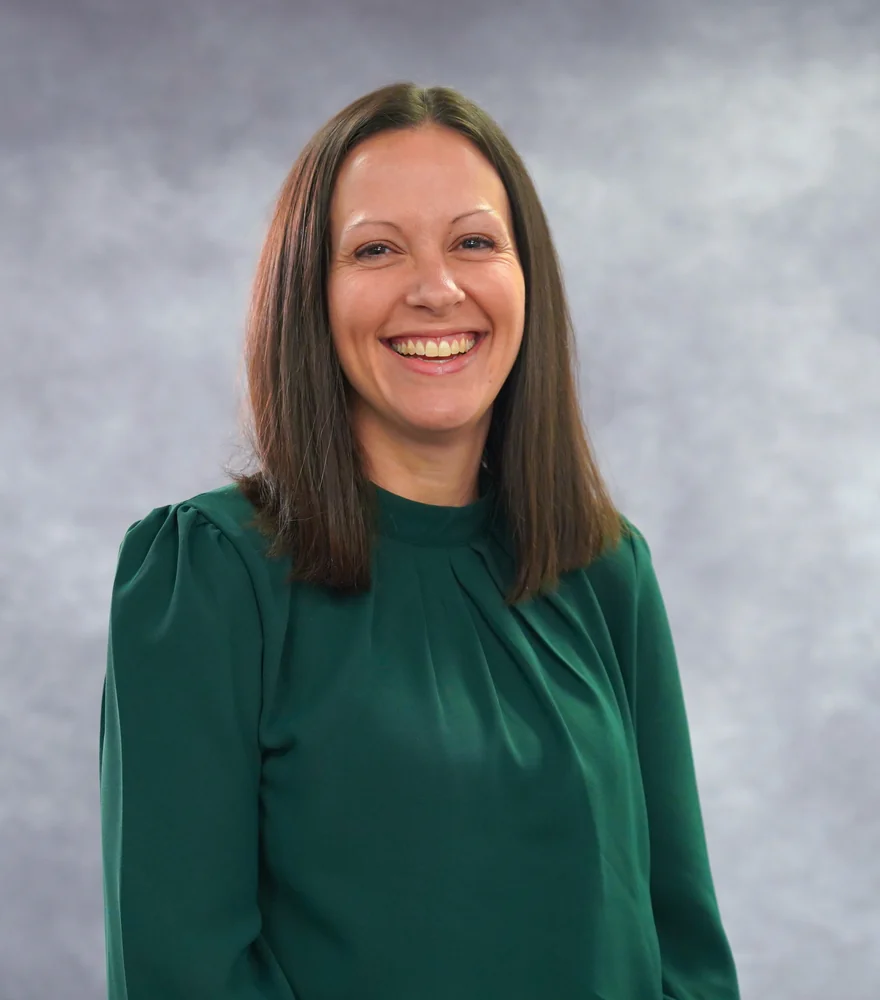 Jennifer Gard, licensed social worker and therapist at Adoption Care Services, smiling headshot