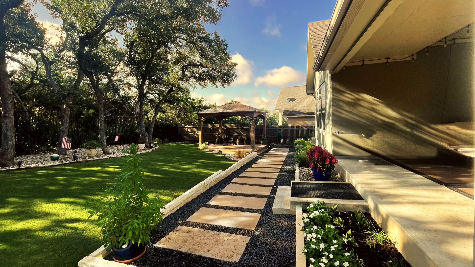 S&S Landscape Design hero — modern Austin landscape with native plants and outdoor living area