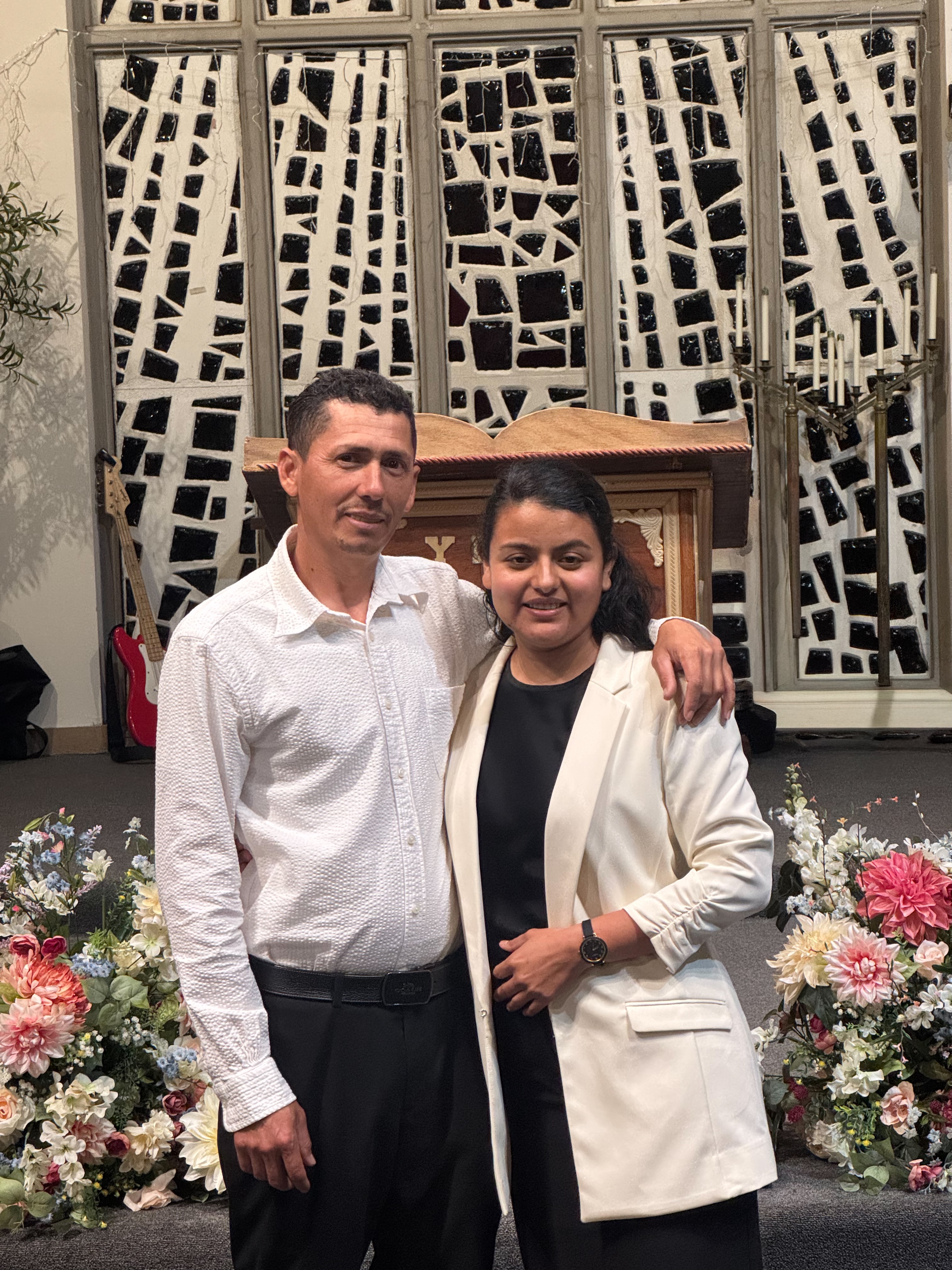 image of parents and staff discussing enrollment