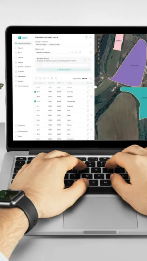 Two hands clicking on the keyboard of a computer.