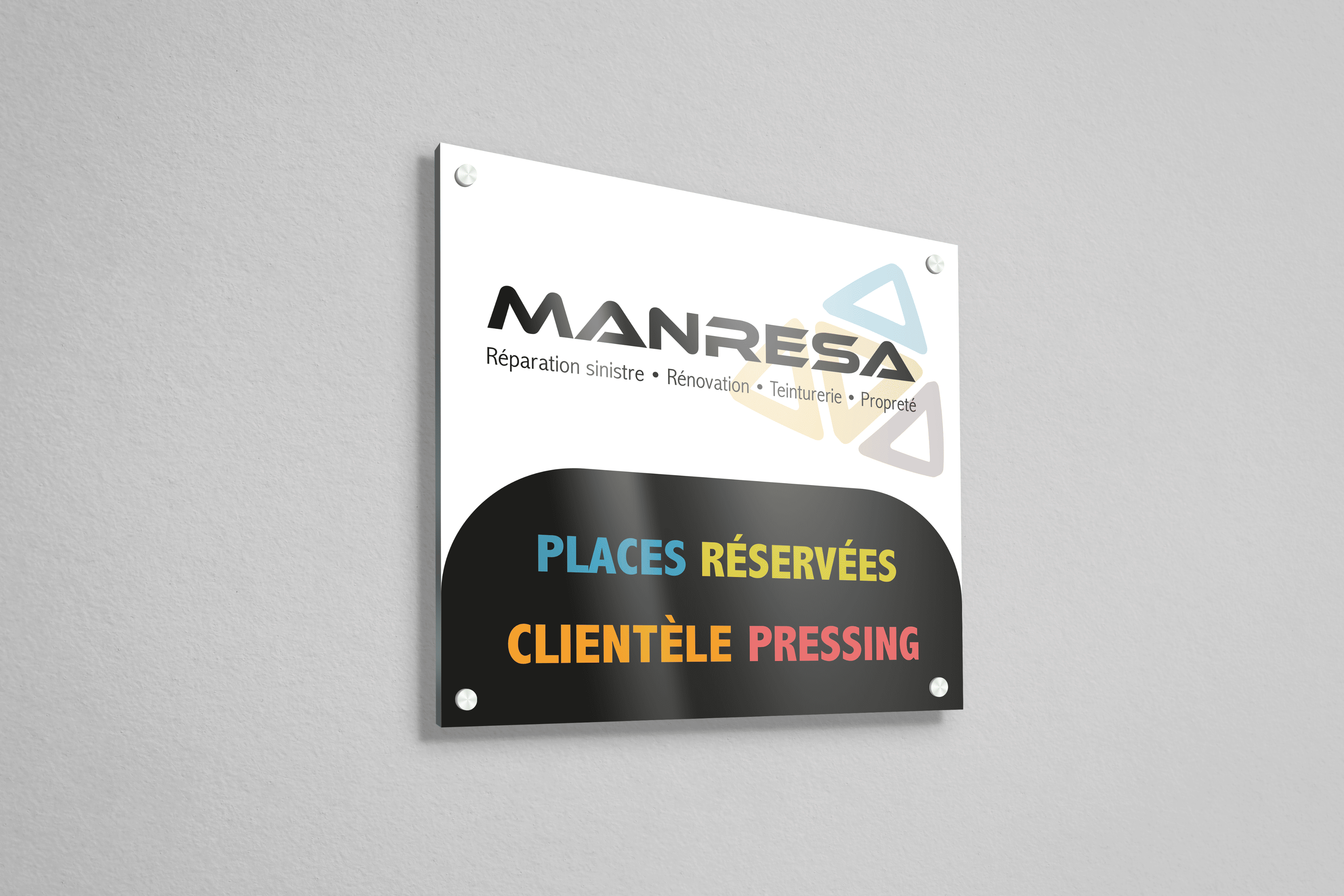 Wall-mounted sign for Manresa with services listed and reserved parking for pressing customers in colorful text.