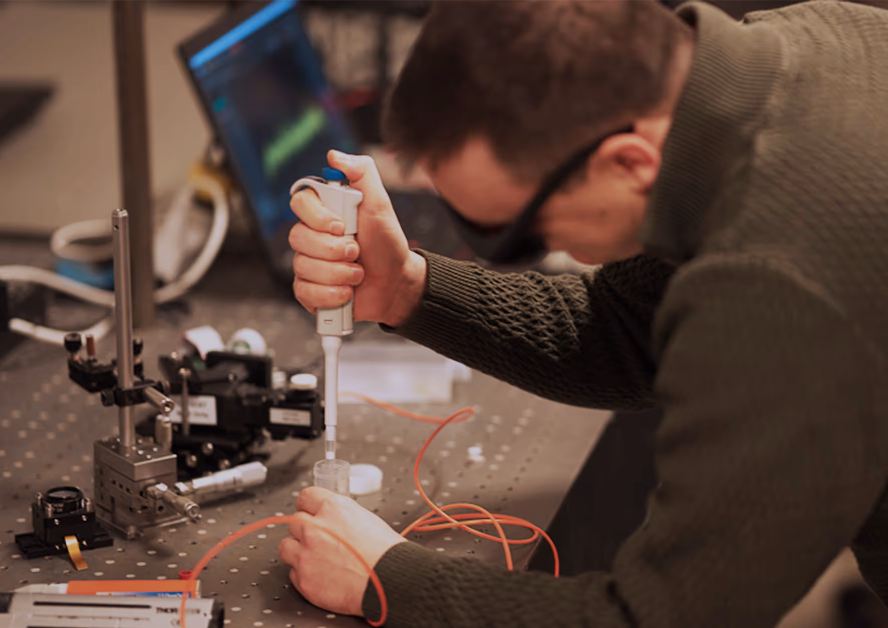 A man examining and developing a product in a lab