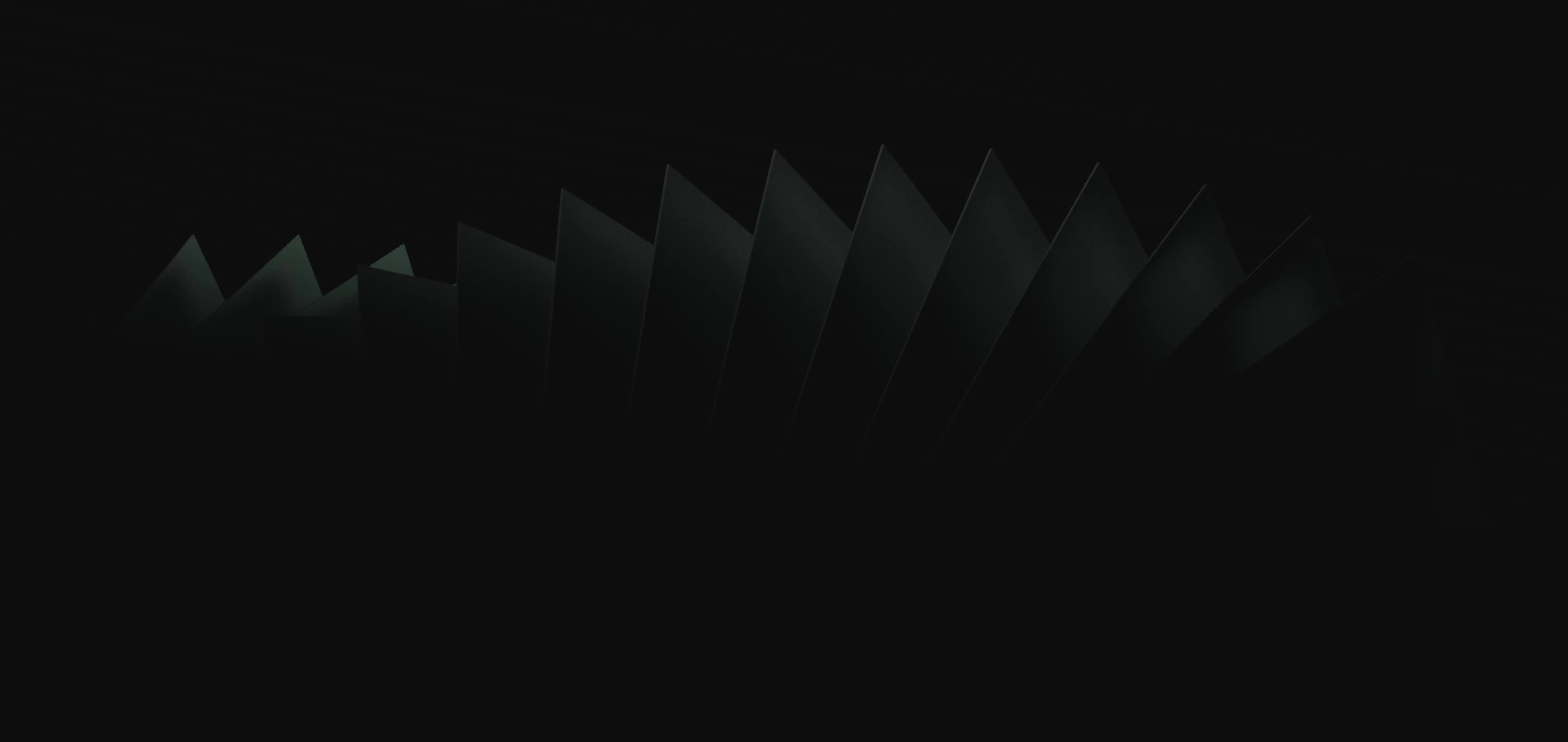 Dark, abstract close-up of overlapping thin black panels arranged in a curved pattern.