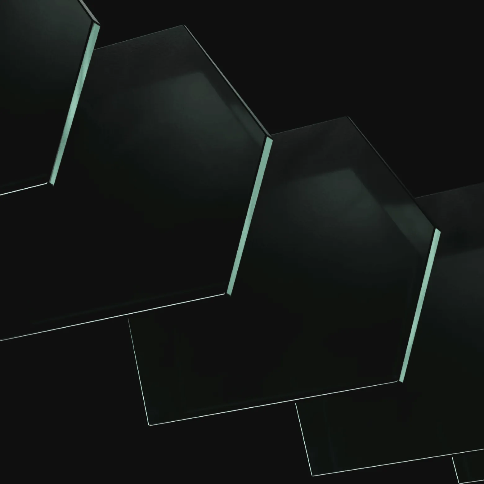 Close-up of a dark, translucent hexagonal pattern with a subtle reflective surface.