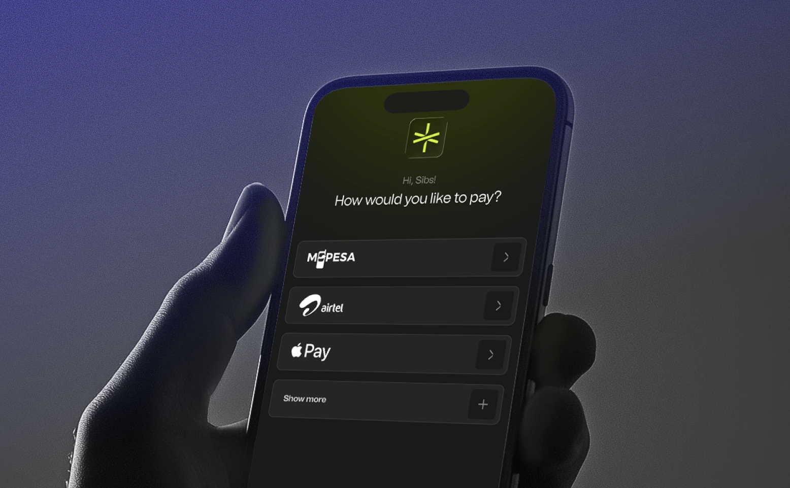 Smartphone screen showing payment method options including M-PESA, Airtel, Apple Pay, and a Show more button.