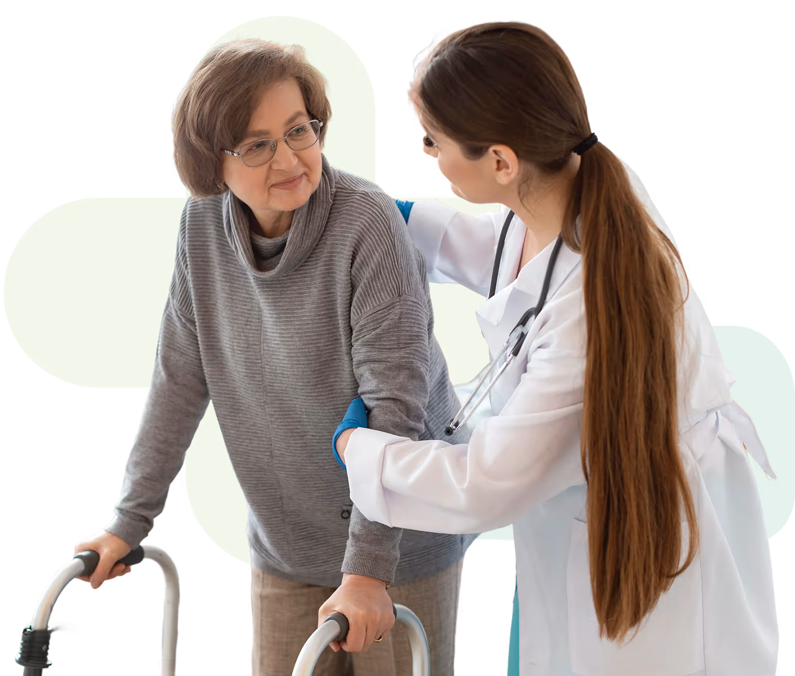 Elderly woman using a walker assisted by a female healthcare professional in a white coat with a stethoscope.