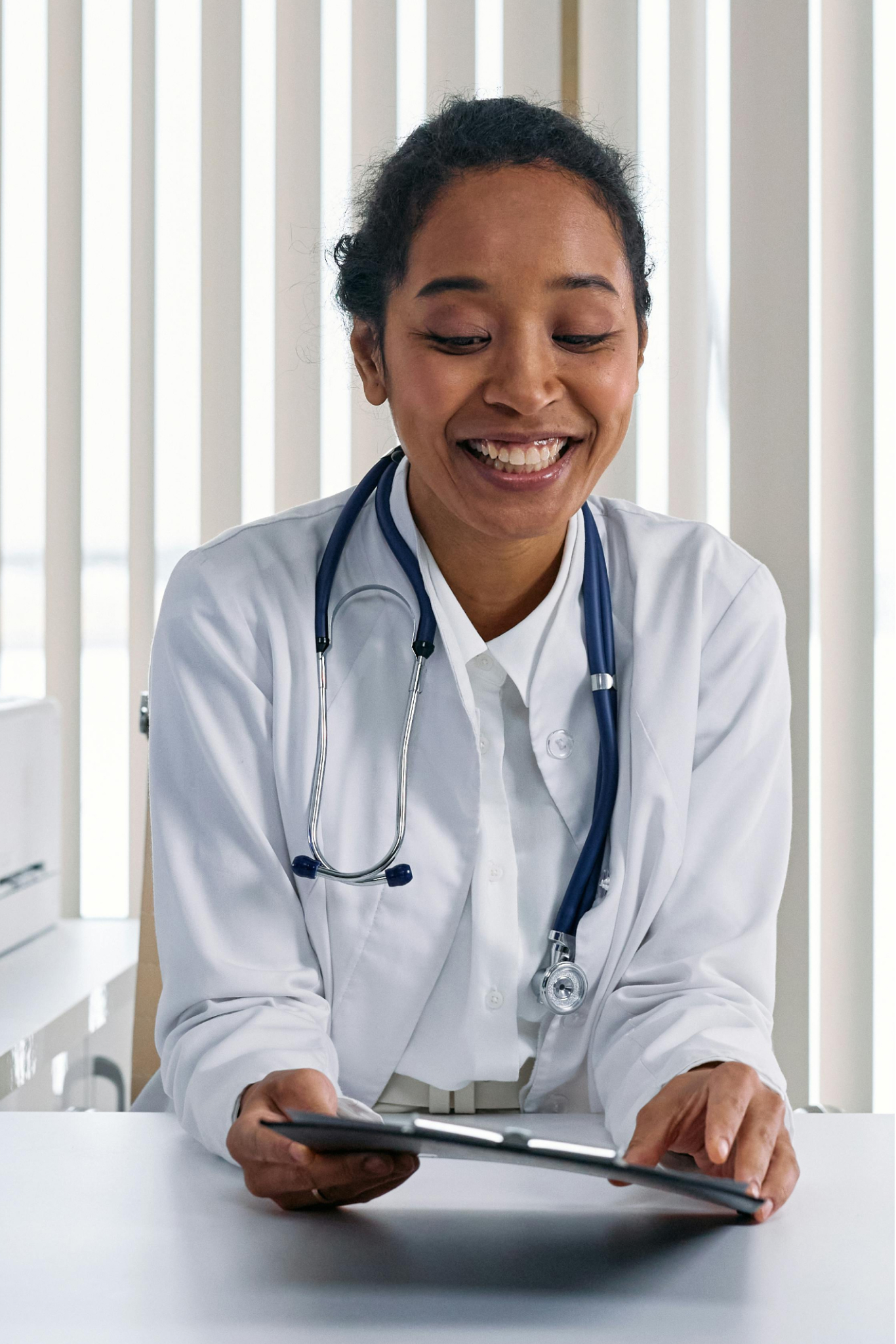 image of a doctor talking to a patient
