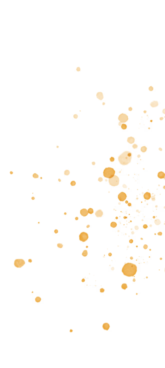 Taches de peinture orange clair dispersées sur un fond transparent noir.