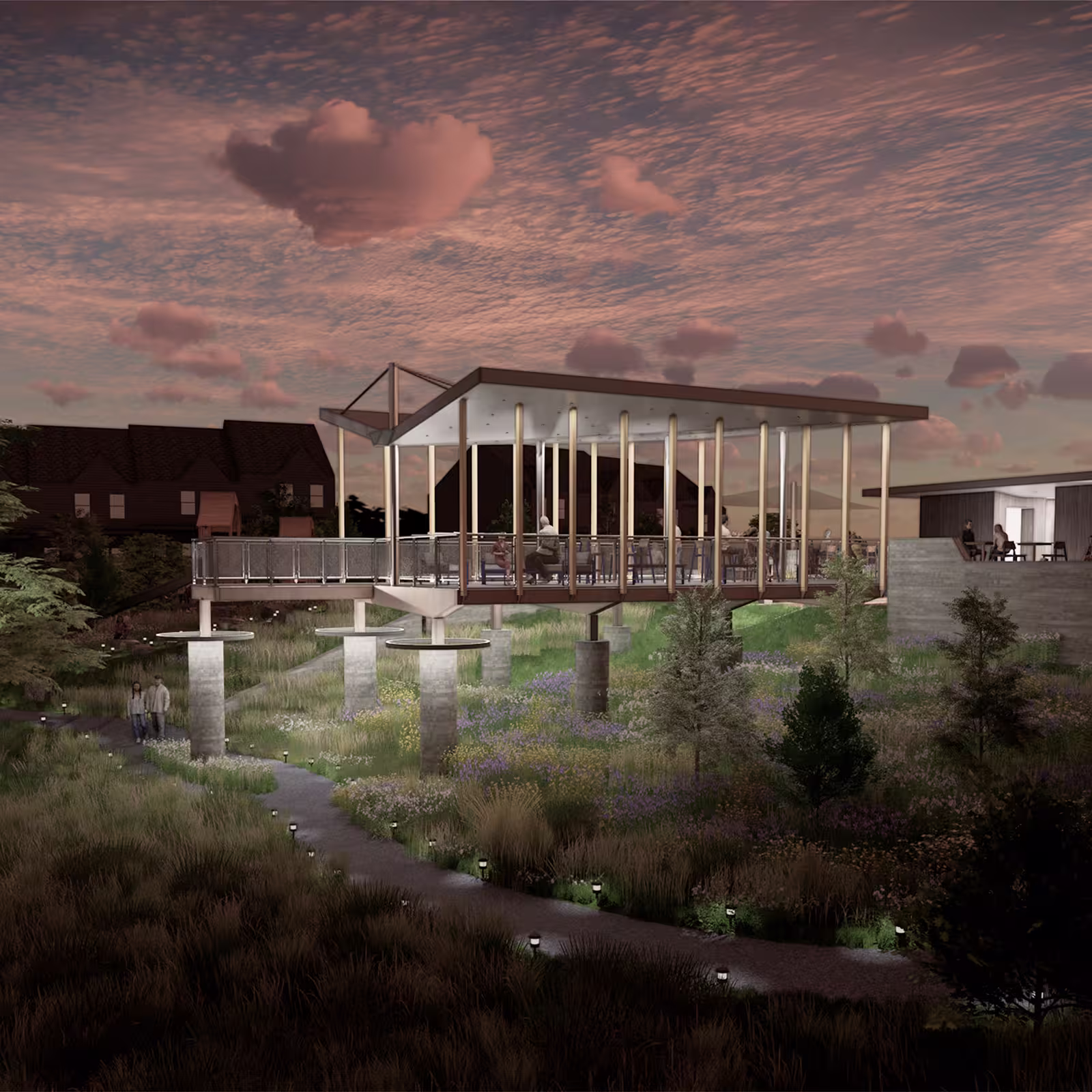 Elevated modern pavilion with glass railings and tall pillars overlooking a landscaped garden with a winding lit pathway at dusk under a cloudy sky.