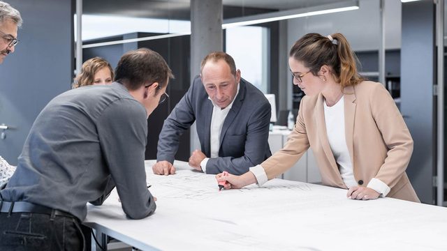 Team von Bastmann und Zavracky im Büro