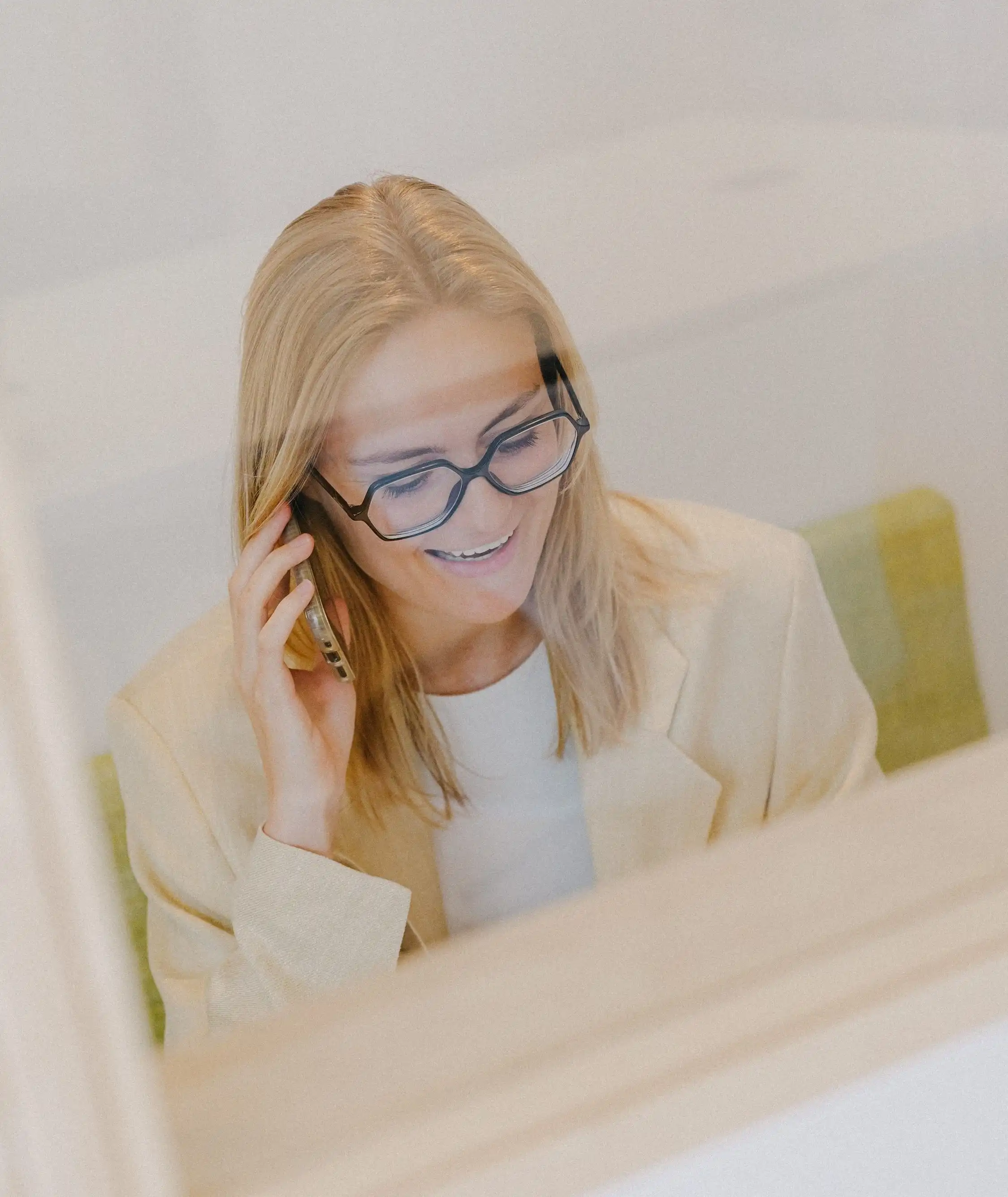 Professional on a phone call at their desk