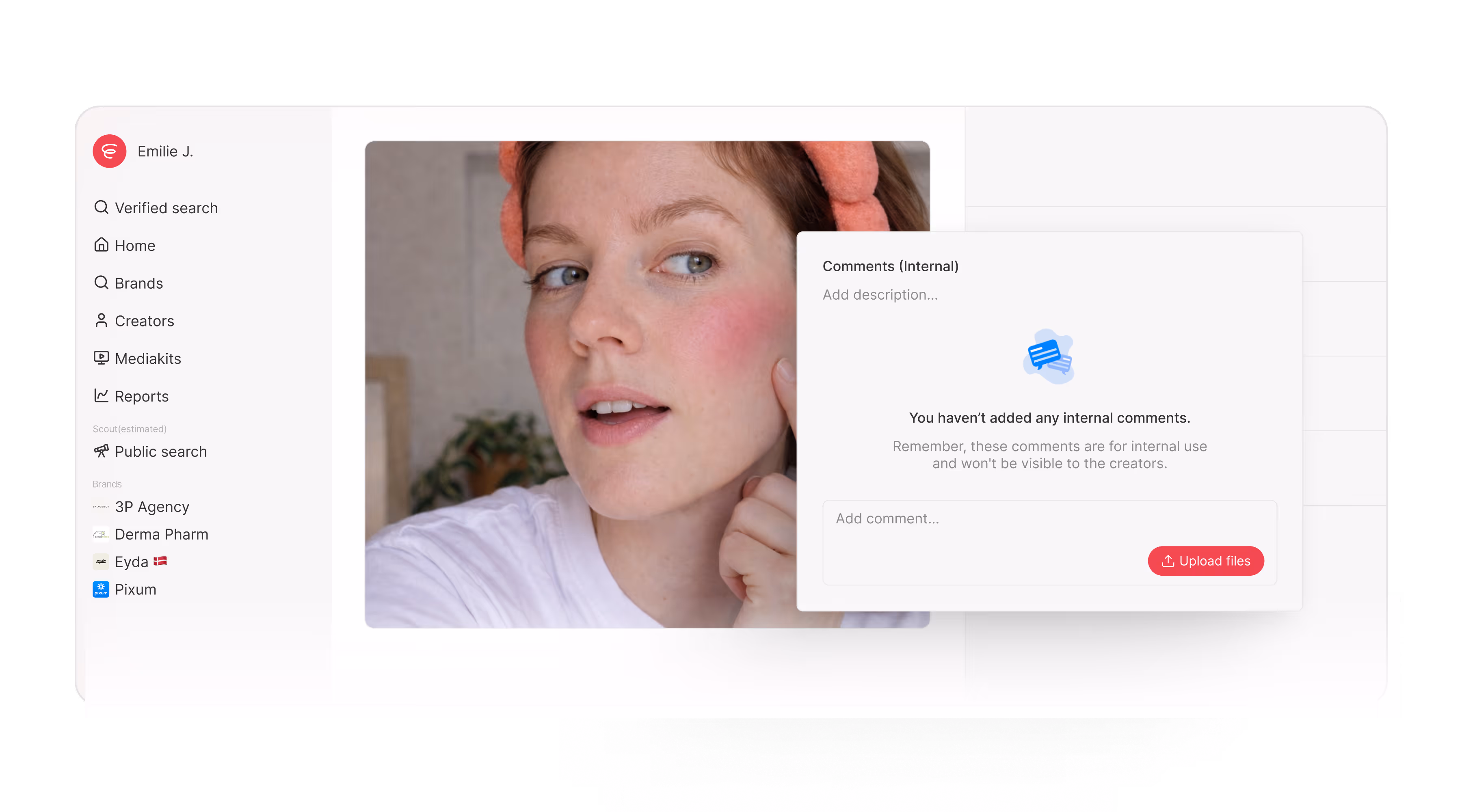 User interface showing a sidebar menu with profile Emilie J. and a panel for adding internal comments and uploading files.