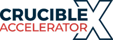 Crucible Accelerator X logo with 'Crucible' in blue, 'Accelerator' in red, and a large 'X' in dark blue.