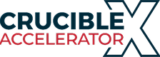 Crucible Accelerator X logo with 'Crucible' in blue, 'Accelerator' in red, and a large 'X' in dark blue.