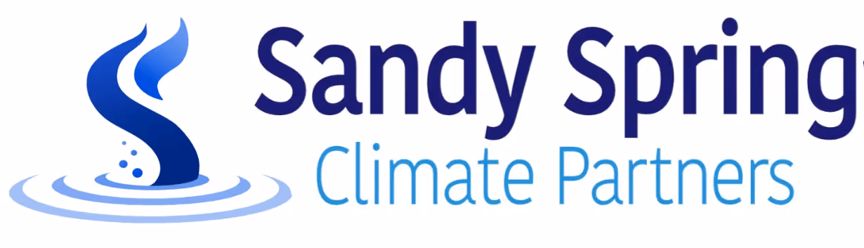 Current brand logo in navy blue cursive lettering.