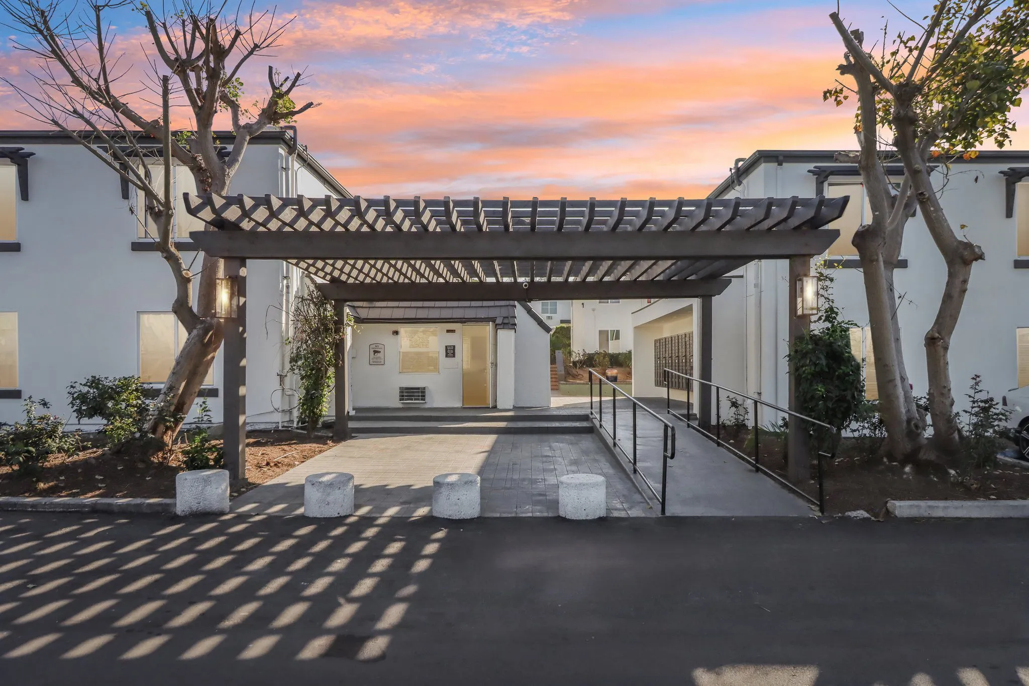 exterior of leasing office at sunset
