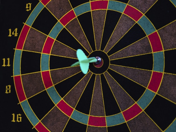 dart game and an arrow right in the middle