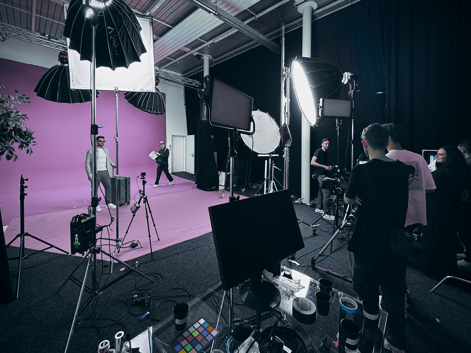 image of professionals discussing strategy around a smart board