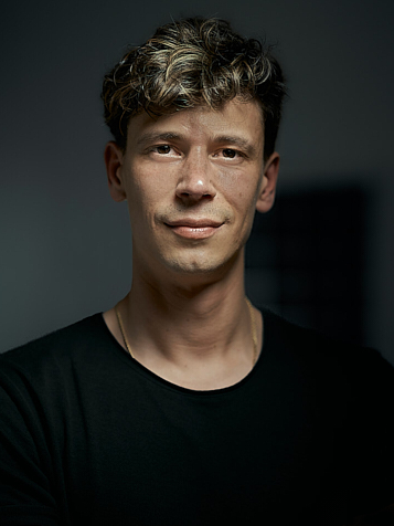 image of a person working on a computer in an office setting (for a mobility and transportation)