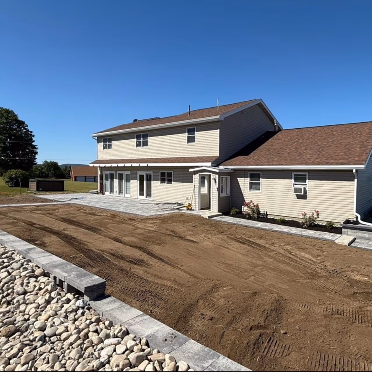 French drain and yard drainage solution near me by LeRoy Property Service in Northern NY