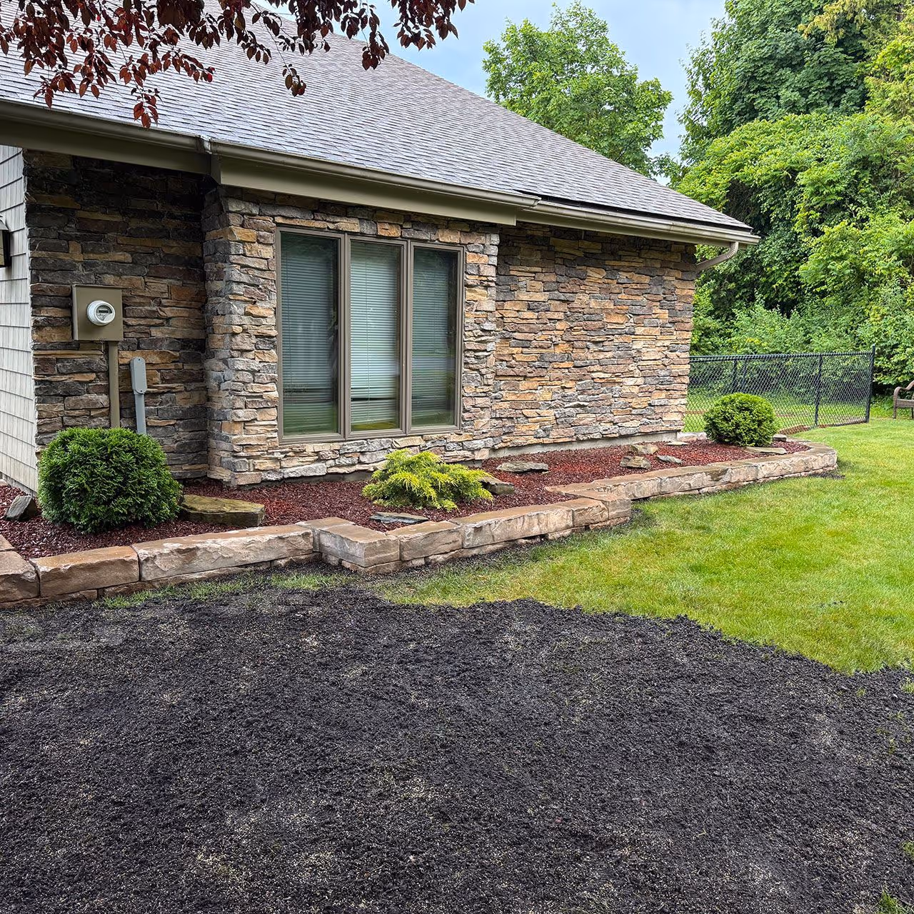 Front yard landscape installation by LeRoy Property Service in Clinton County NY