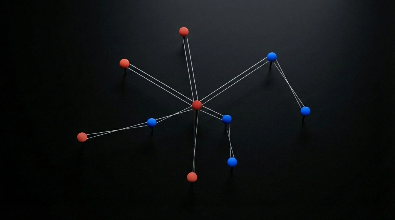 Dark, minimalist 3D render of pins on a black surface, connected by taut strings radiating from a central red pin. Four red pins (top, upper left, bottom, and center) and four blue pins (upper right, right, lower right, lower left) are linked by straight white lines converging on the central red pin, evoking a conspiracy-board or network diagram.