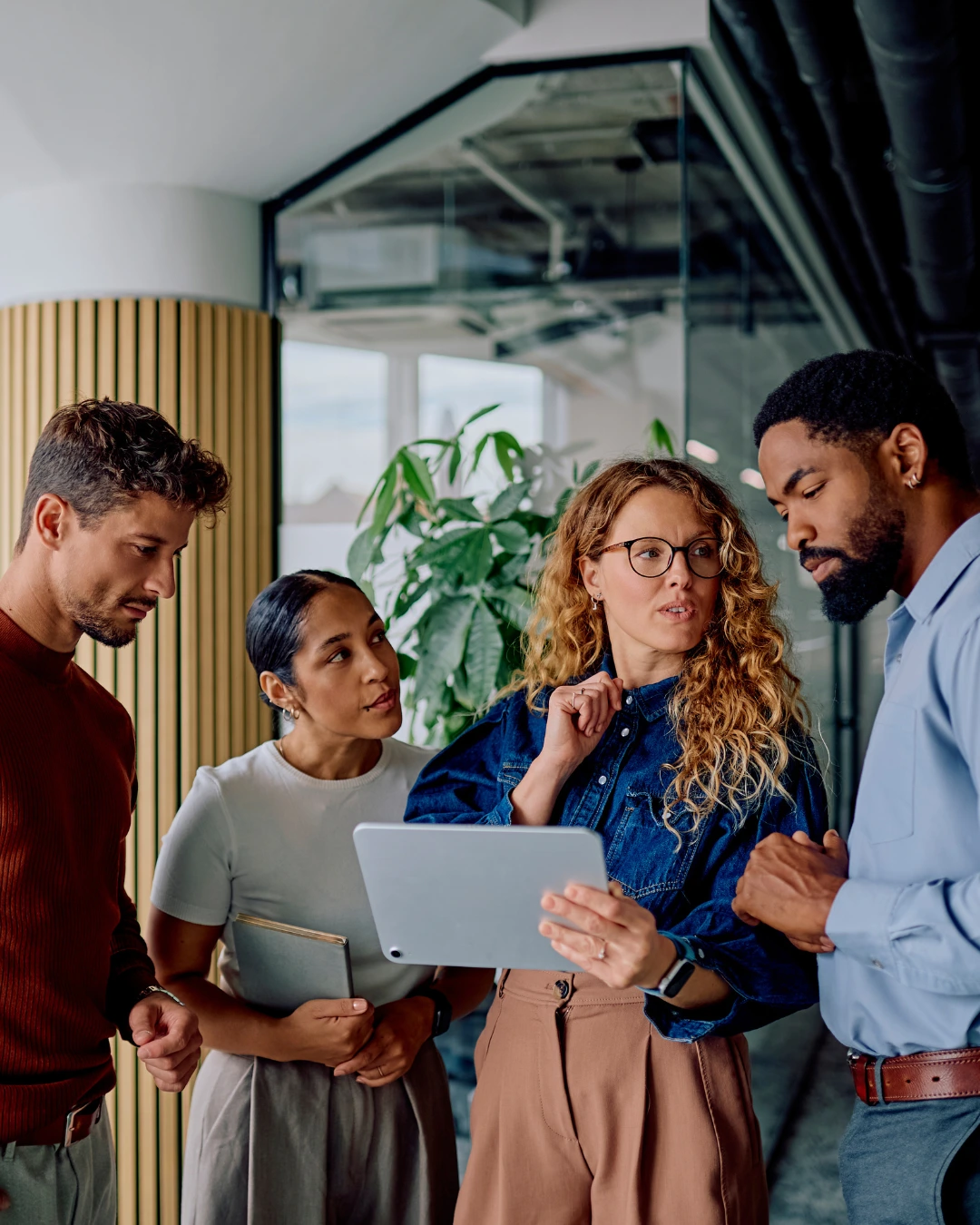 Header image of recruiter talking at desk