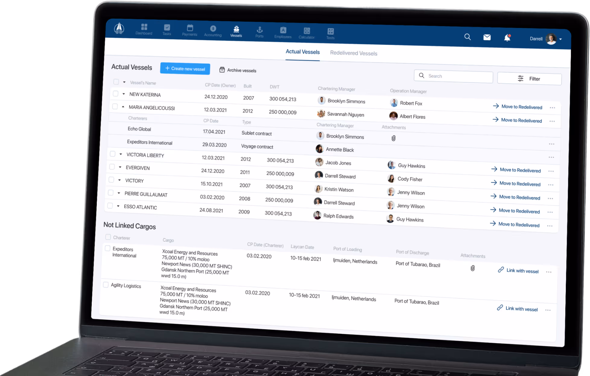 Laptop screen displaying a vessels management dashboard with lists of actual vessels and not linked cargos, showing vessel names, contract details, managers, and options to move vessels or link cargos.