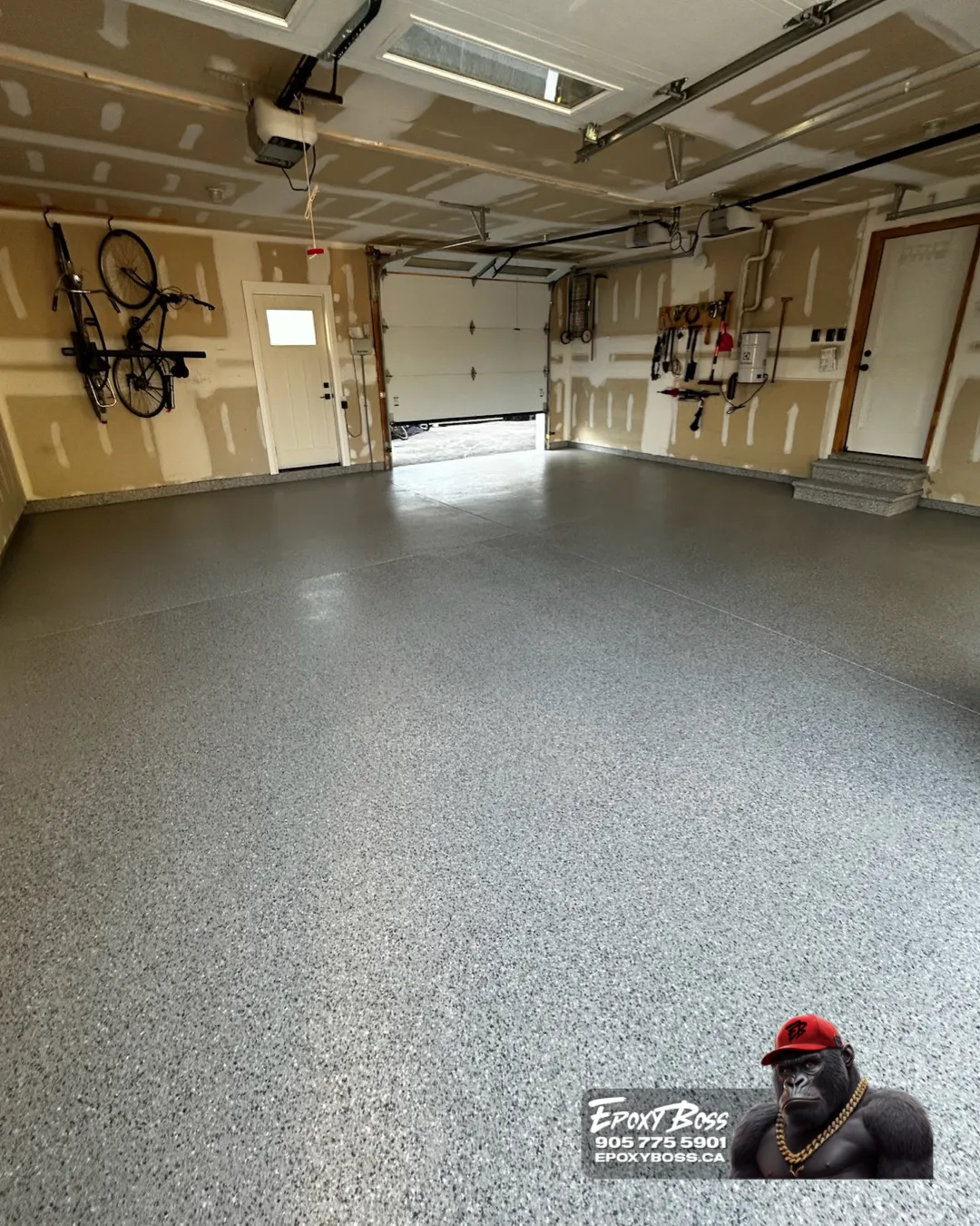 Epoxy Boss technician preparing residential garage floor by diamond grinding