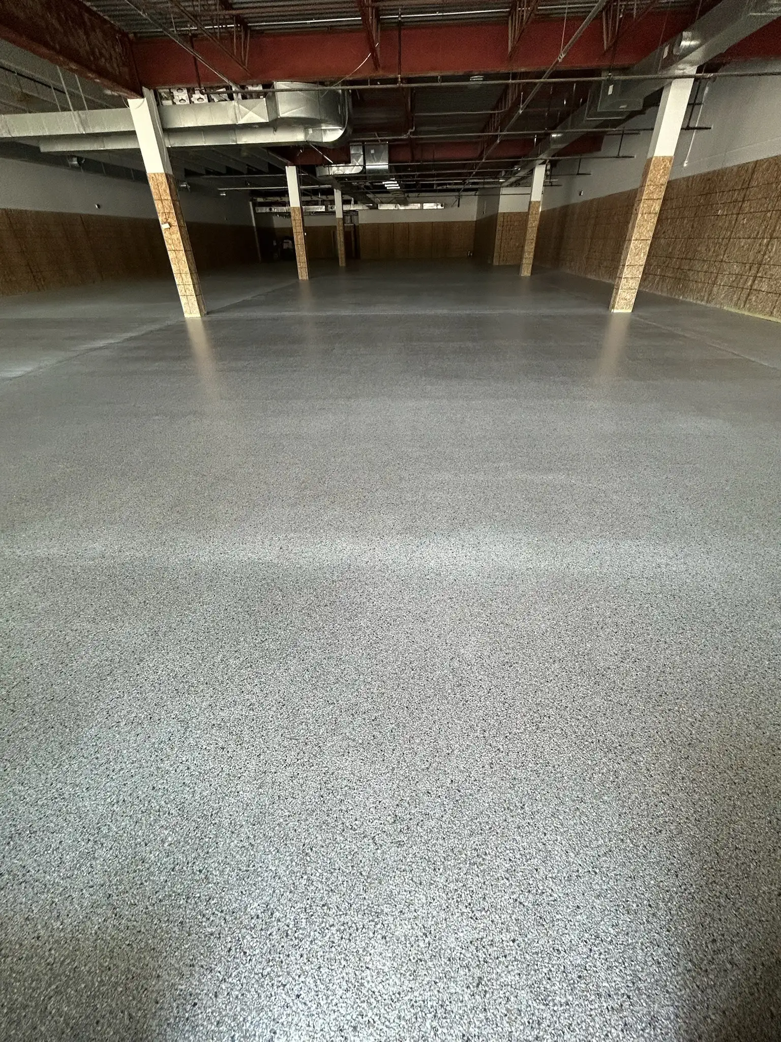 Polished concrete floor in Toronto retail store lobby