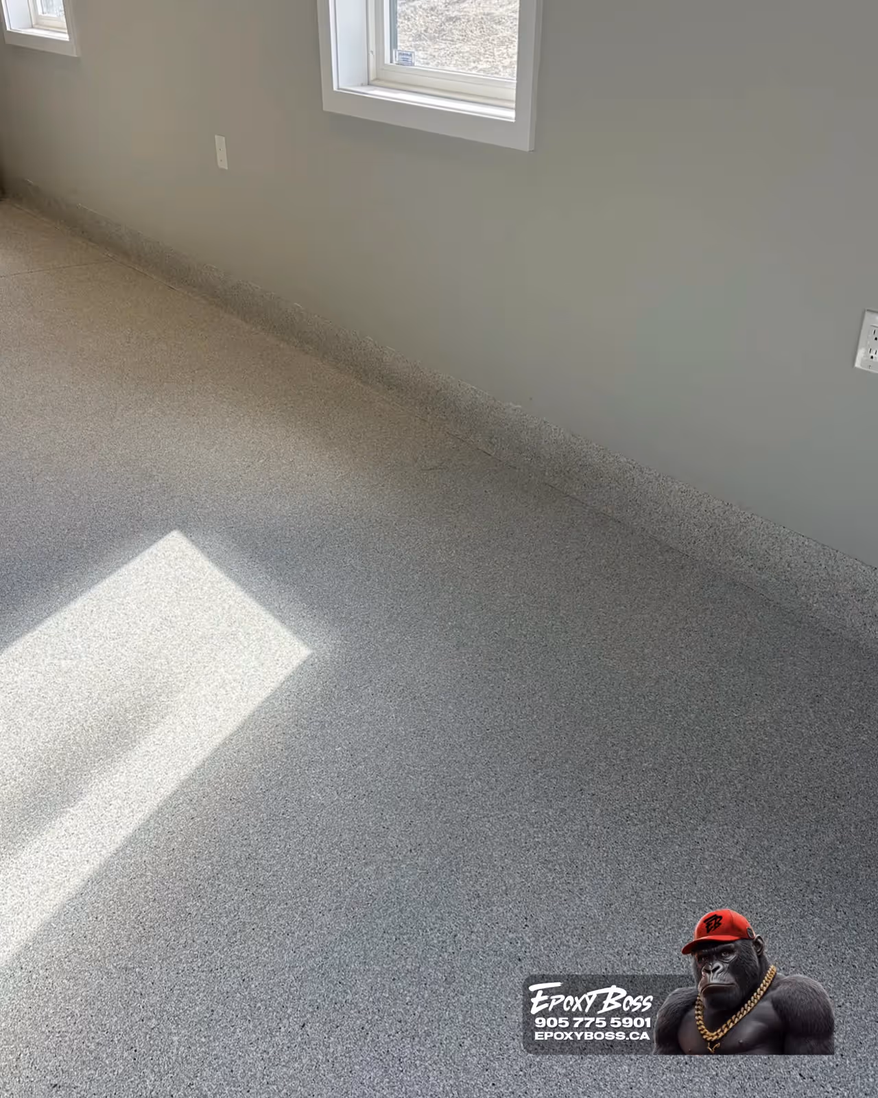 New concrete garage sealed with slip-resistant flake system in Burlington